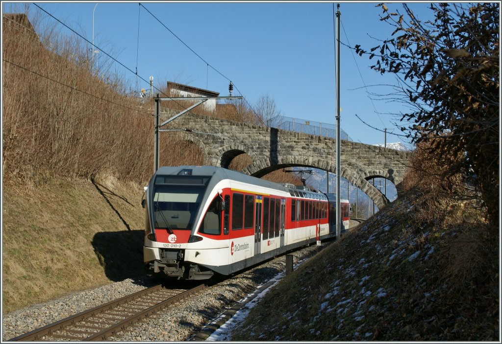 Der Triebwagenzug 130 010-2 als Regionalzug von Interlaken Ost nach Meiringen bei Nierried. 
05.02.2011