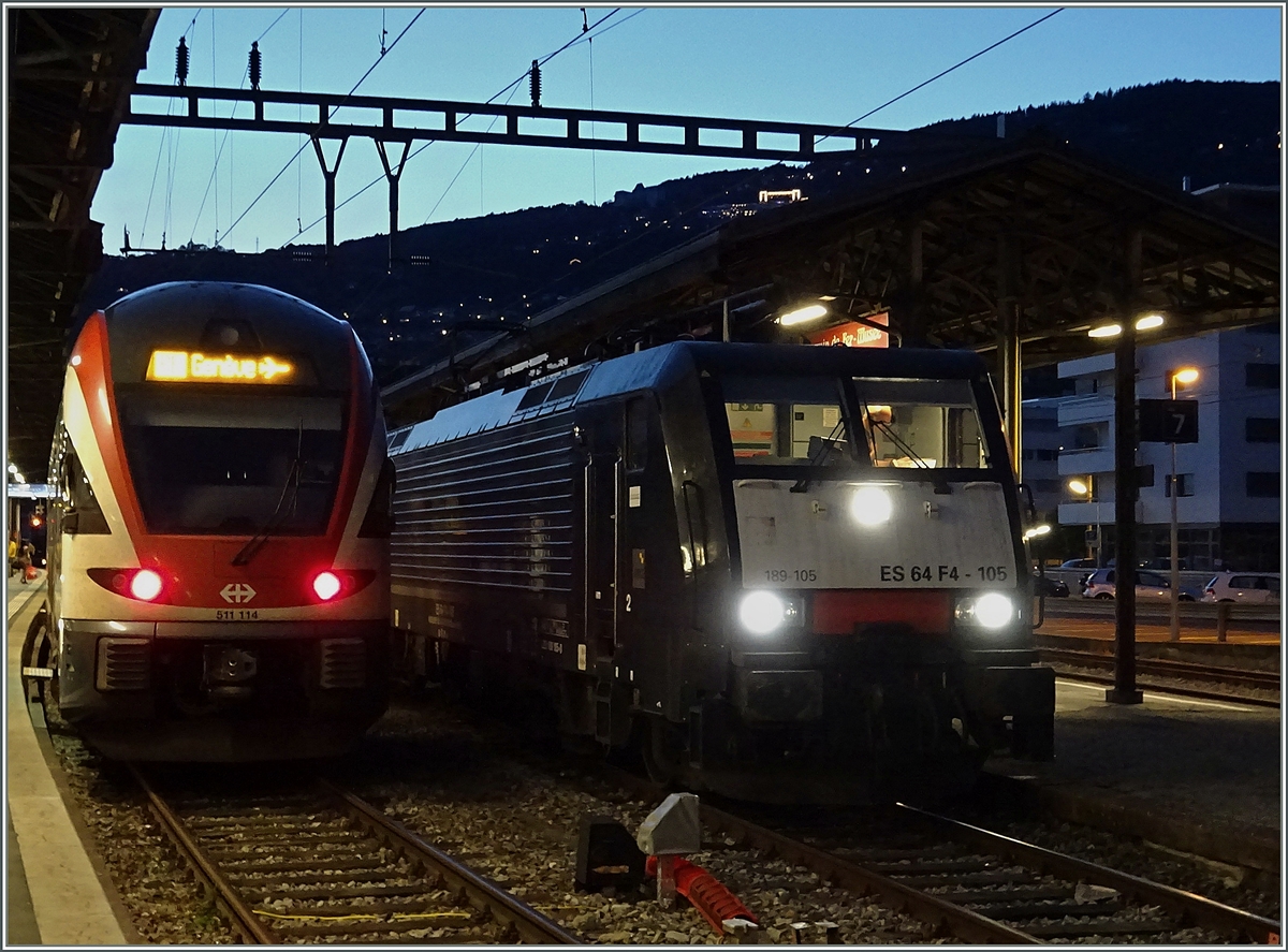 Da ich mit 189 Bildern immer etwas im  Verzug  bin hier gleich drei Fotos der ES 64 F4 - 105 (UIC 91 80 6189 105 D-DISPO Class 189 VL) mit einem Ölzug in Vevey. 
3. August 2015