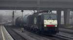 BR 189 (ES 64 F4-) ITL ES 64 F4-200 oder 189 200-9 mit einem �ler und ordentlichem Tempo festgehalten im Harburger Bahnhof in Hamburg. 29.12.2009