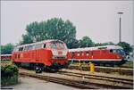 br-218-v-164/771630/die-db-218-145-4-und-der Die DB 218 145-4 und der VT 612 507-4 'Stuttgarter Rössle' in Lindau. 

Analogbild vom 14. Juni 1996