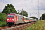 Mit einem IC nach Stralsund fährt die 101 110 am 05.08.2014 durch Sildemow in Richtung Rostock Hbf.