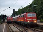 111 029-5 stand mit dem morgendlichen Regionalexpress nach Stuttgart Hbf im Bahnhof von Backnang,daneben wartete 218 208-7.