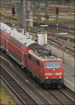 111 075 (Leihlok aus Baden Wrttemberg) mit RE 9 aus Aachen am 26.03.11 bei der Einfahrt in den Siegener Bahnhof