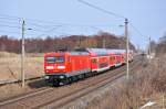 Mit dem RE 4308 (Rostock-Hamburg) rollt die 112 133 am 09.04.2013 durch Sildemow.