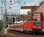 143 870-4 schob die S6 nach Kln-Nippes aus dem Klner Hauptbahnhof am 15.7.11.