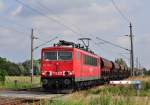 Mit einem leeren Schttgutzug rollt die 155 223 am 16.09.2012 durch Bentwisch in Richtung Rostock.
