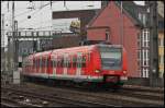 423 248 als S 13 nach Troisdorf am 19.02.11 kurz vor dem Klner Hauptbahnhof