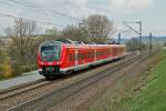 E-Triebzug 440 703 von Passau kommend auf dem Weg nach Mnchen, bei Vilshofen aufgenommen am 12.4.2012.