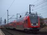 Angefhrt von einem Dosto-Steuerwagen 3.Generation fuhr der RE nach Kiel aus dem Bahnhof Elmshorn am 22.1