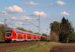 Vom Steuerwagen  Sierksdorf  angefhrt donnerte der RE nach Kiel durch Halstenbek am 17.4.