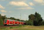 Eigene Bilder/144262/der-regionalexpress-nach-kiel-angefhrt-von Der Regionalexpress nach Kiel angefhrt von dem Doppelstocksteuerwagen Lbeck rauschte mit Hchstgeschwindigkeit durch Halstenbek am 10.6.11.