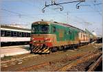 D 345/118063/fs-345-110-mit-einem-regionalzug FS 345 110 mit einem Regionalzug in Venezia.
(gescanntes Analogbild) 
29.04.1994