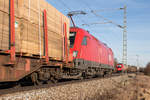 br-1116-es-64u2-1525kv/542621/am-kilometer-294-am-ortsrand-von Am Kilometer 29.4 am Ortsrand von Eglharting trafen sich am 25.02.17 zwei Güterzüge, die jeweils mit einer Lok der BR 1116 bespannt waren.