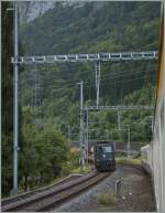 In Drlingen kreuzt unser Regionalzug nach Interlalen eine Ae 6/6 auf dem Weg nach Spiez.