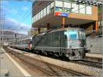 Die noch grne Re 4/4 II 11158 mit ein EC von Basel nach Milano bei der Einfahrt in Olten am 22.