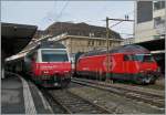 Die SBB Re 460 048-2 und 460 081-3 in Lausanne. Die IR auf Gleis 3 wird nach Brig fahren, der IC auf Gleis 1 nach St.Gallen
31. Jan. 2015