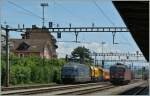 BLS Re 465 015-6 aud SBB Re 6/6 11606 in Renens VD. 
30. Mai 2012  