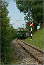 Bei der Hippschen Wendescheibe (Einfahrsignal von Blonay Seite Chamby) fhrt ein B-C Zug bergwrts.
4. Aug. 2012