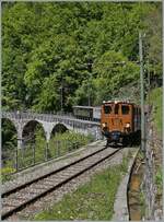 b-c-blonay-chamby/756388/nostalgie--vapeur-2021--nostalgie 'Nostalgie & Vapeur 2021' / 'Nostalgie & Dampf 2021' - so das Thema des diesjährigen Pfingstfestivals der Blonay-Chamby Bahn. Die Blonay-Chamby Bernina Bahn Ge 4/4 81 mit einem Personenzug nach Chaulin überquert den Baye de Clarens Viadukt. 

23. Mai 2021