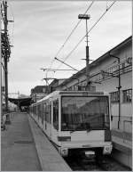 Die M1 ist mehr eine Stadtbahn als Mtro. 
Zwei Bem 558 vor der Abfahrt in Rennes VD nach Lausanne Flon am 26. Jan. 2011