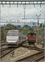 Lyria/147873/ein-klassiker-tgv-und-ee-33lausanne Ein Klassiker: TGV und Ee 3/3....
Lausanne, den 13. Juni 2011