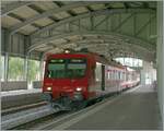 560-npz-und-domino/755634/im-neuen-bahnhof-von-le-brassus Im 'neuen' Bahnhof von Le Brassus wartet der CJ RBDe 560 141-4 'La Vouivre' (ex SBB RBDe 560 002-8 'Sempach Neuenkirch') mit Bt als Regionalzug nach Vallorbe auf die Abfahrt.

16. August 2009