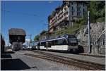 Die MOB GDe 4/4 6006 ist nach Montreux weiter gefahren, und im Bild ist nun der MOB Regionalzug nach Zweisimmen mit den Triebfahrzeugen Be 4/4 9202 an der Spitze und dem ABe 4/4 9302 am Schluss.