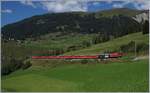 Oberhalb von Bergün/Bravuogn konnte ich diesen Alulba-Schnellzug mit eienr Ge 6/6 II auf der Fahrt von St.Morizt nach Chur fotografieren.