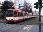 Eine Doppeltraktion aus Stadtbahnwagen B der KVB ist am 17.03.2010 am Barbarossaplatz in K�ln unterwegs - im Hintergrund sieht man noch die Tunnelrampe zum Neumarkt.