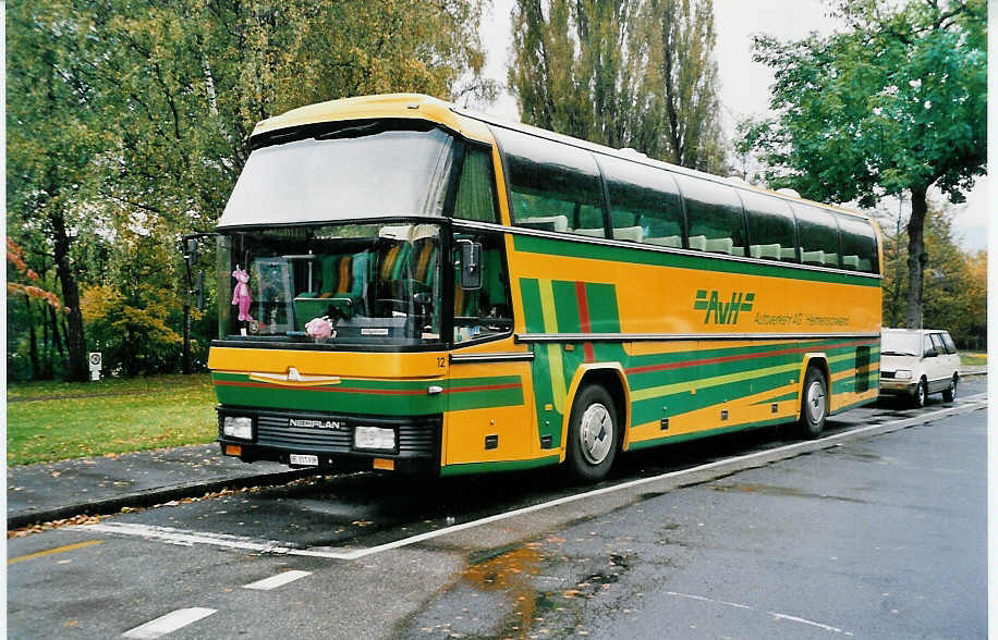 (037'413) - Dinic, Thun - BE 311'938 - Neoplan (ex AvH Heimenschwand Nr. 12) am 25. Oktober 1999 in Thun, Lachen