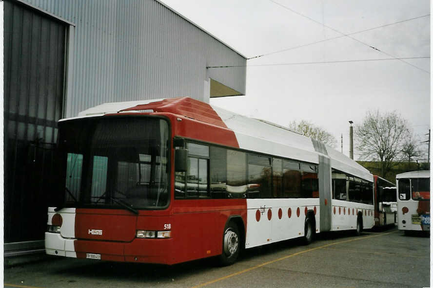 (066'117) - TPF Fribourg - Nr. 518/FR 300'433 - MAN/Hess Gelenkduobus am 21. Mrz 2004 in Fribourg, Garage