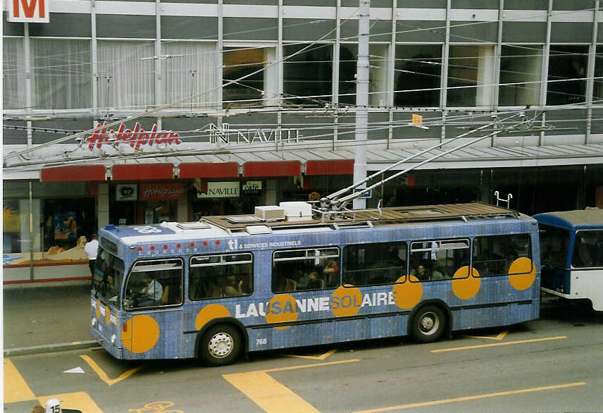 (069'120) - TL Lausanne - Nr. 768 - NAW/Lauber Trolleybus am 8. Juli 2004 in Lausanne, Place Riponne