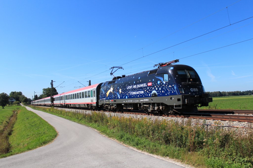 1116 126-4  Licht ins Dunkel  auf dem nach Salzburg. Aufgenommen am 9. September kurz vor bersee am Chiemsee.