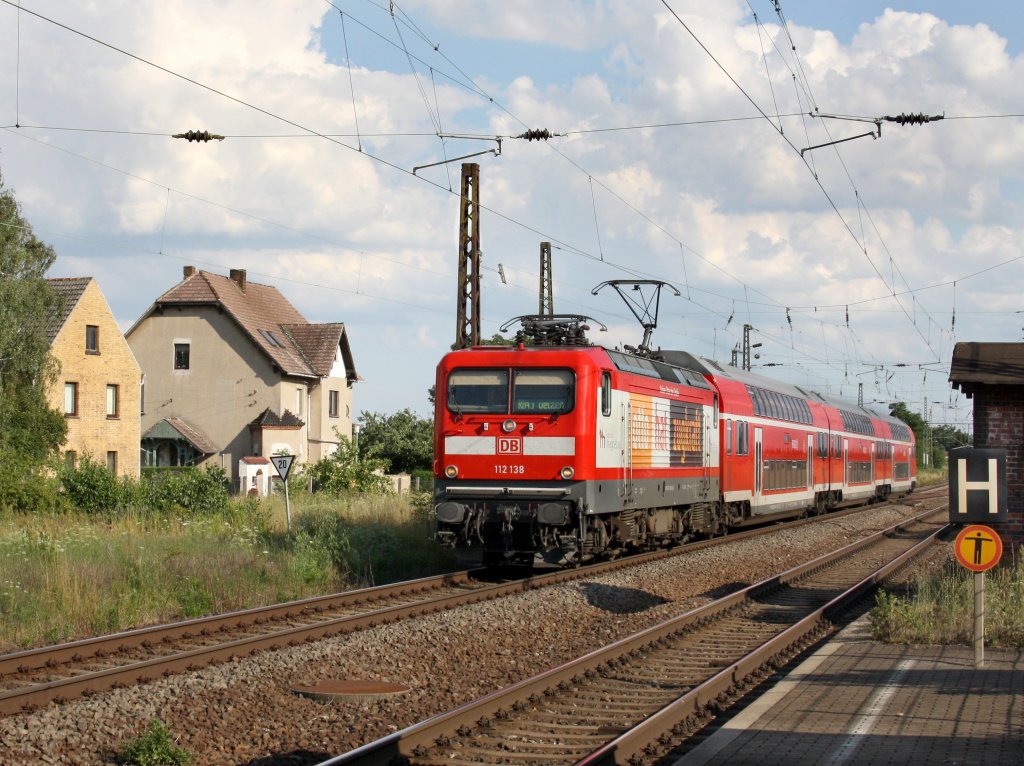 Die 112 138 mit einer RB am 09.07.2011 bei der Einfahrt in Stumsdorf. 
