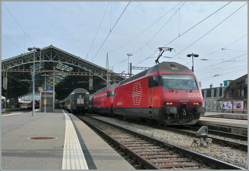 Gleich zwei Re 460 ziehen den IR 1422 von Brig nach Genve Aroport. 
Hier bei der Abfahrt in Lausanne am 26.02.2011.