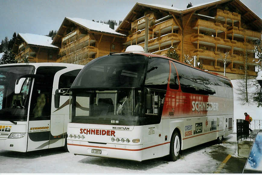 (083'205) - Schneider, Langendorf - SO 28'915 - Neoplan am 19. Februar 2006 beim Bahnhof Saanenmser