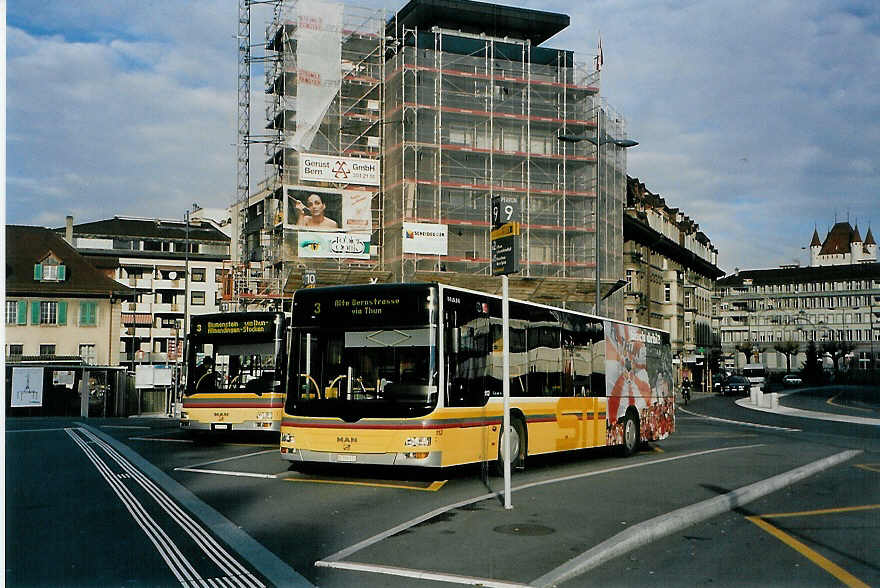 (091'009) - STI Thun - Nr. 113/BE 700'113 - MAN am 11. Dezember 2006 beim Bahnhof Thun