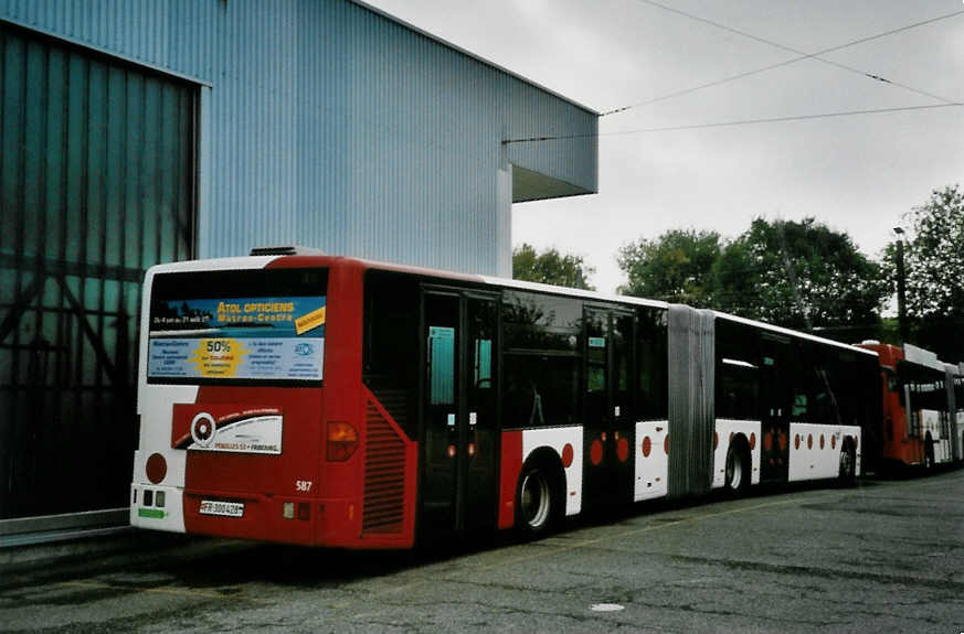 (100'612) - TPF Fribourg - Nr. 587/FR 300'428 - Mercedes am 27. Oktober 2007 in Fribourg, Garage