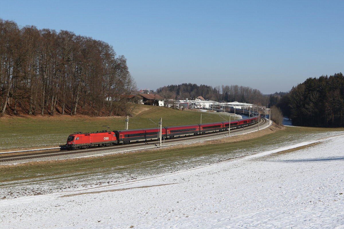 1016 026 mit einem Railjet aus Salzburg kommend am 19. Februar 2025 bei Axdorf.