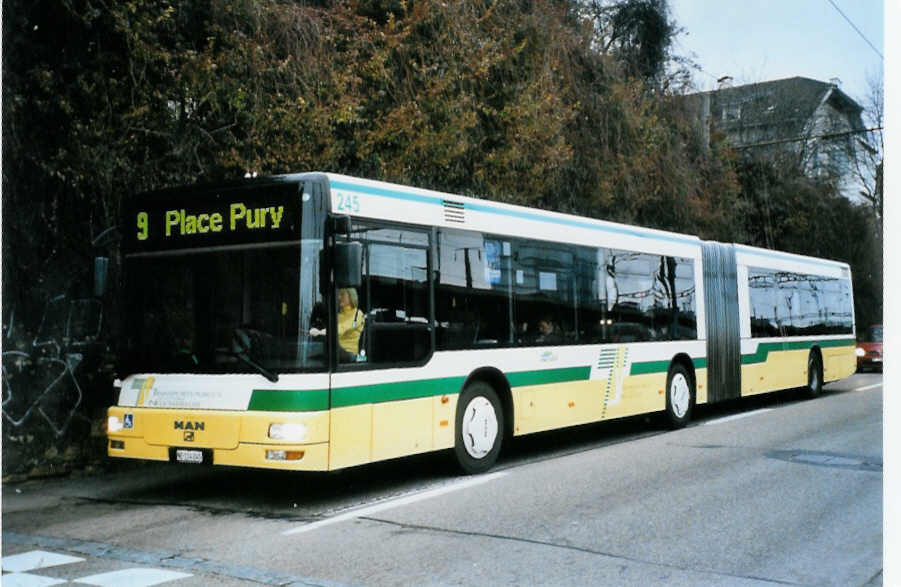 (102'214) - TN Neuchtel - Nr. 245/NE 114'245 - MAN am 22. Dezember 2007 beim Bahnhof Neuchtel