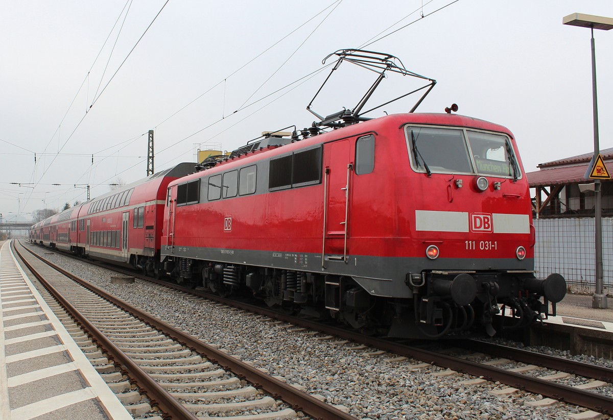 11 031-1 am 3. Mrz 2012 im Bahnhof von Bernau am Chiemsee.