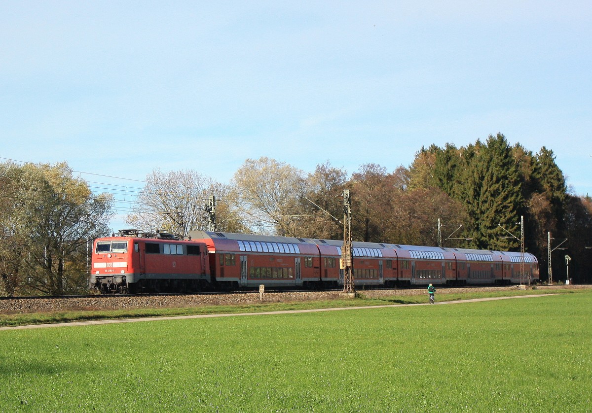 111 210-1 am 8. November 2013 kurz nach dem Bahnhof von Prien am Chiemsee.