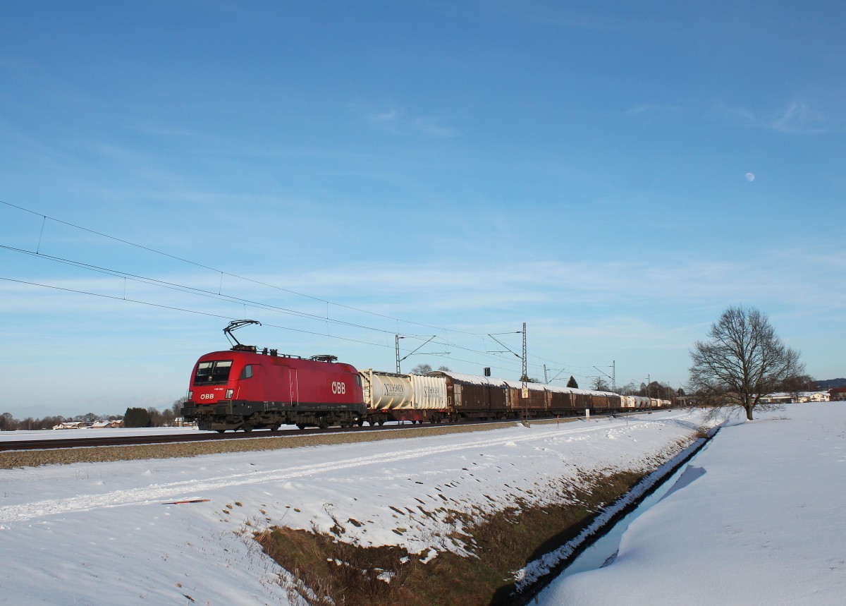 1116 067-0 an einem sonnigen Wintertag bei bersee am Chiemsee. Aufgenommen am 31. Januar 2015.