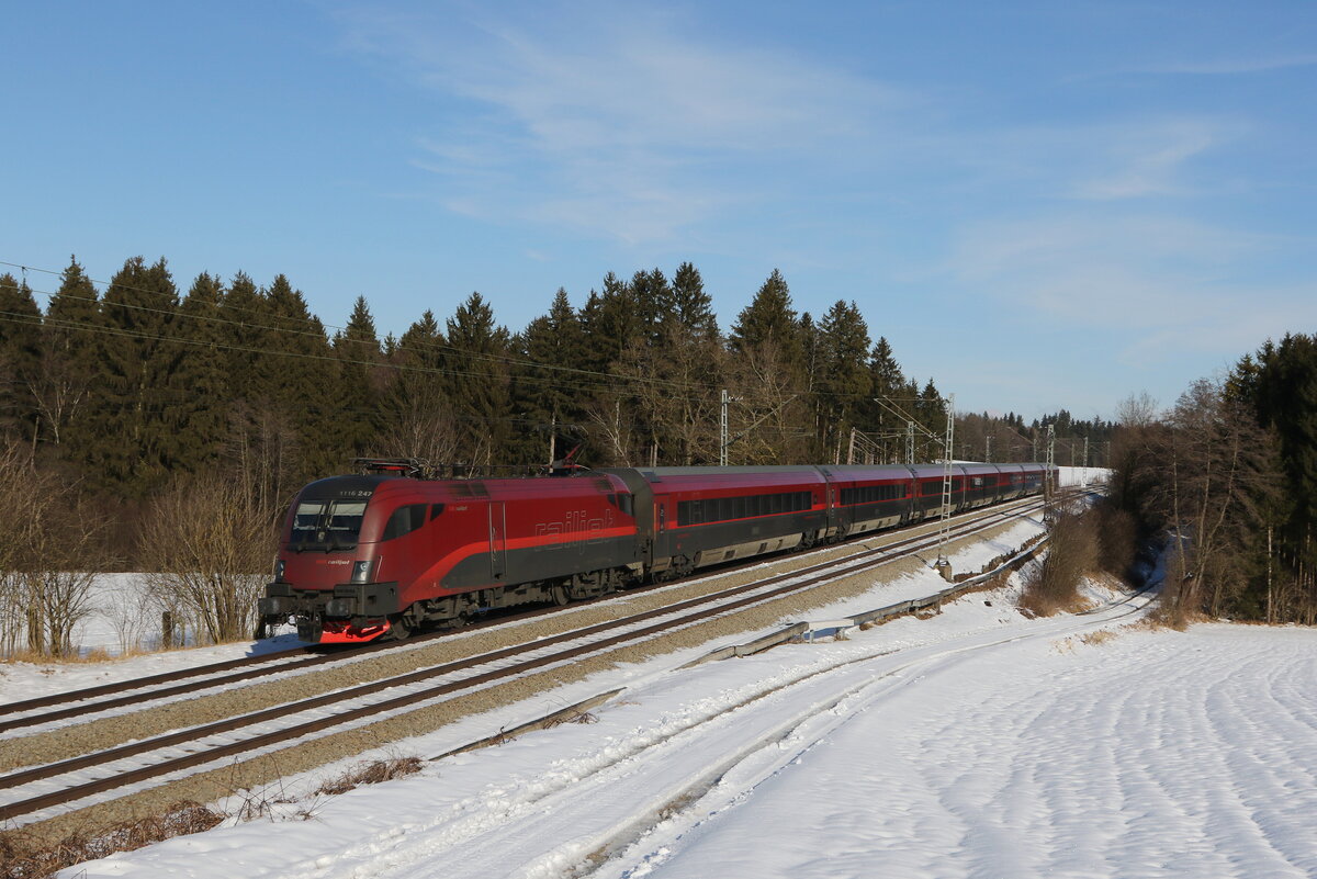 1116 247 mit einem  Railjet  aus Salzburg kommend am 24. Januar 2022 bei Grabensttt.