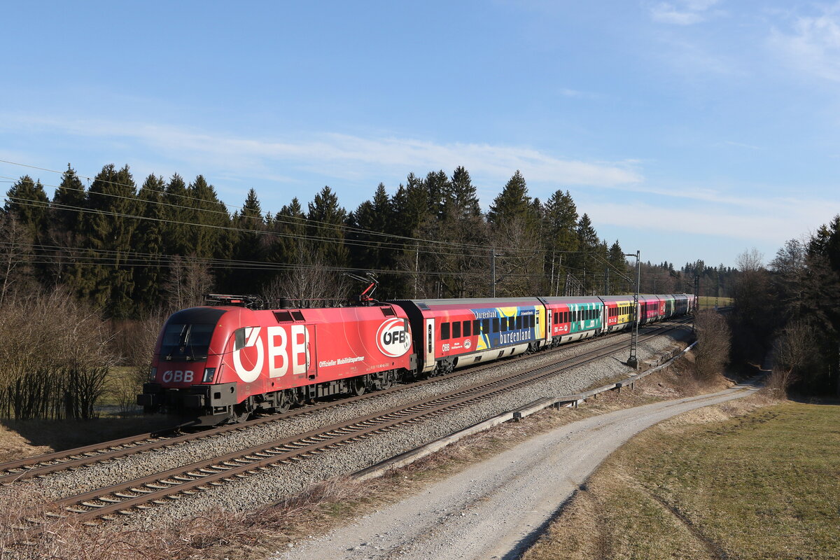 1116 249 mit dem  FB-Railjet  am 3. Mrz 2022 bei Grabensttt im Chiemgau.