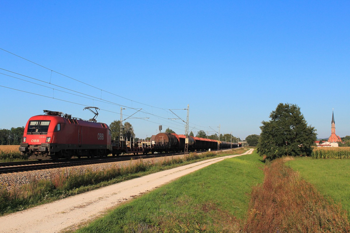 1116 263-3 mit einem gemischten Gterzug am 9. September 2012 bei bersee am Chiemsee.