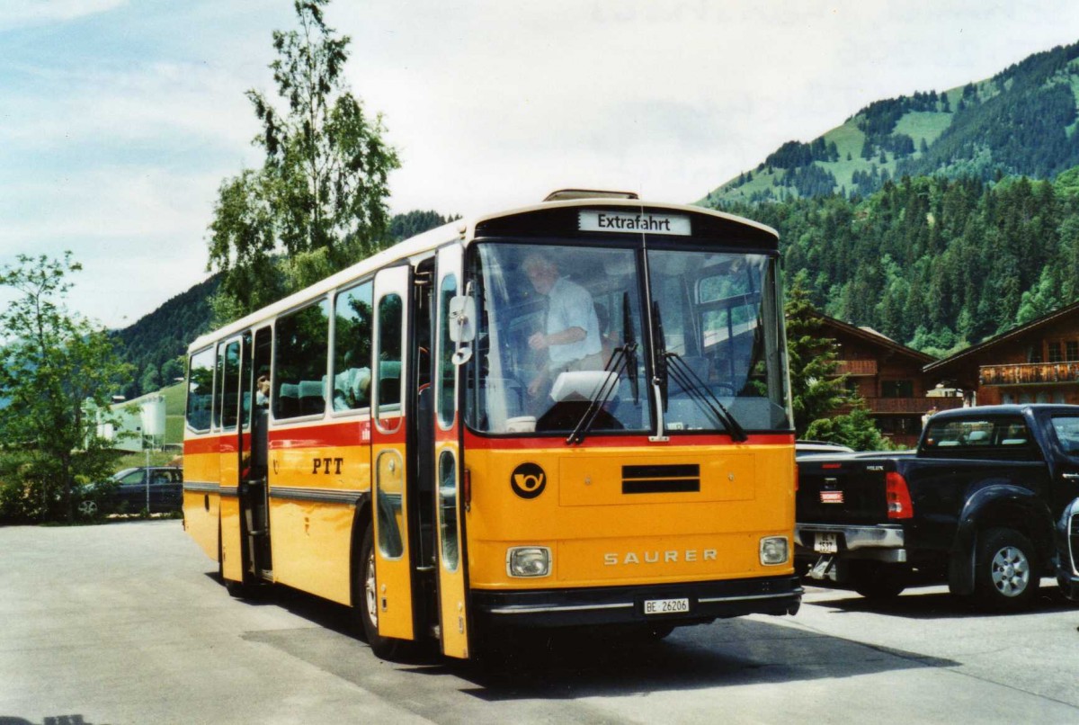 (117'635) - Schmid, Thrishaus - BE 26'206 - Saurer/Tscher (ex P 24'244) am 14. Juni 2009 beim Bahnhof Saanen