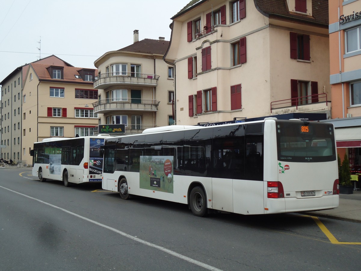 (143'409) - TPN Nyon - VD 318'367 - MAN am 22. Februar 2013 beim Bahnhof Nyon