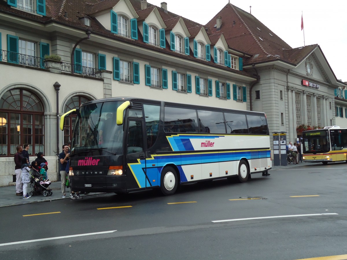 (146'275) - Mller, Uttigen - BE 133'382 - Setra am 8. August 2013 beim Bahnhof Thun