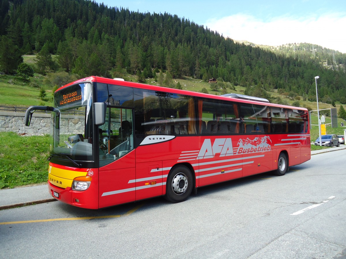 (147'030) - AFA Adelboden - Nr. 24/BE 26'701 - Setra am 2. September 2013 beim Bahnhof Oberwald (Einsatz AVG M.)